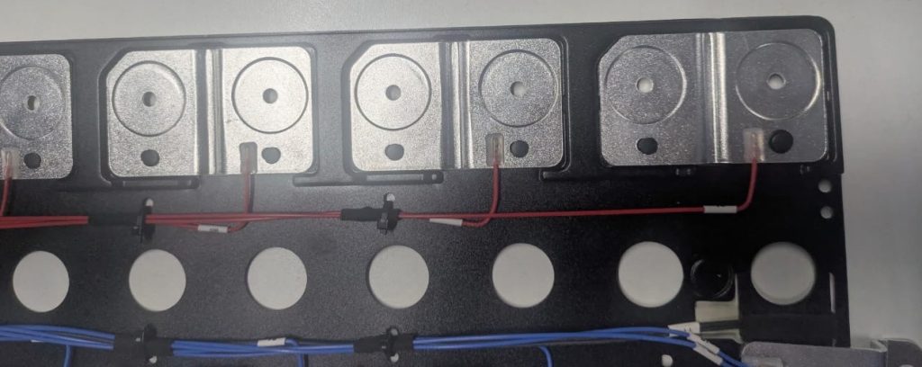 Lithium battery CCS busbar assembly with connected cells and sensing leads